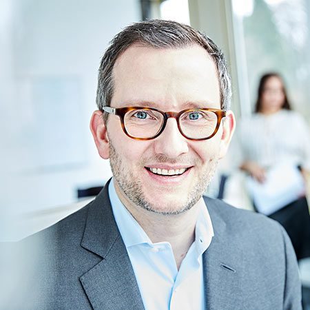 Das Porträtfoto von Christian Motter, Managing Director bei Deutsche Zinshaus Luxembourg.